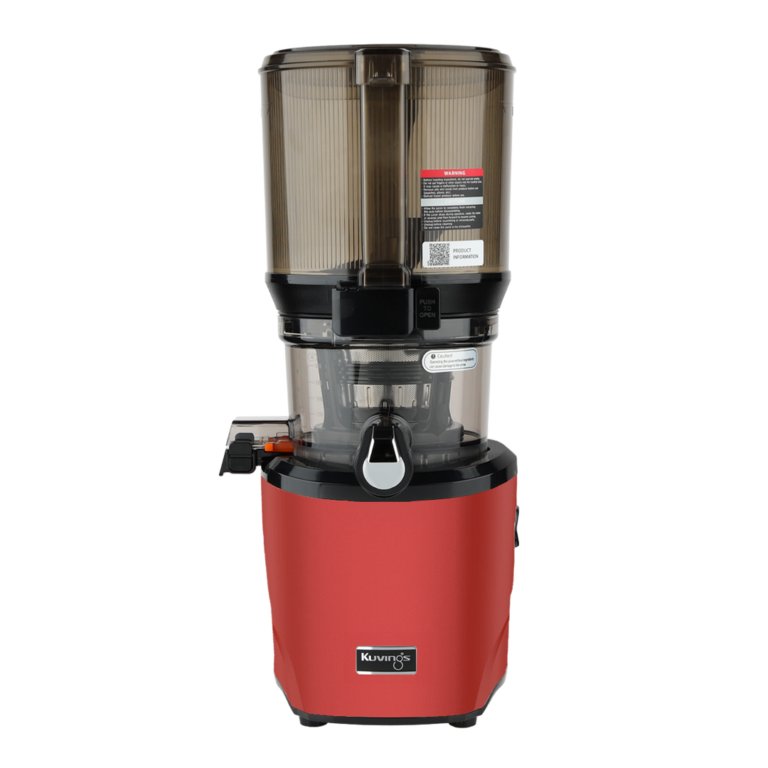 Red and black juicer on a white background