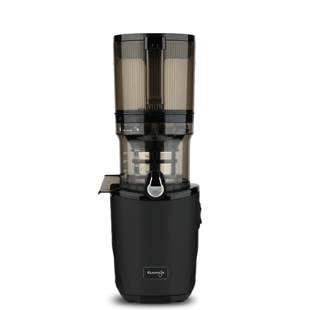 Straight-on studio product shot of a black Kuvings AUTO8 whole slow juicer featuring a large 2000ml transparent grey auto-hopper container assembly, isolated against a transparent grid background.