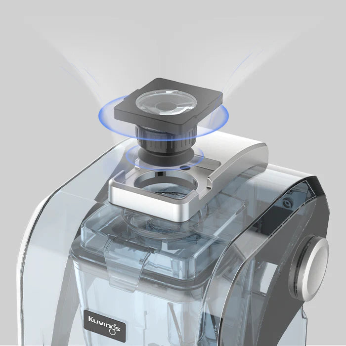 High-angle close-up view of a product rendering showcasing the top vacuum valve mechanism of a Kuvings CB1000 blender, featuring a glowing blue ring graphic that represents air extraction or vacuum sealing against a light gray background.